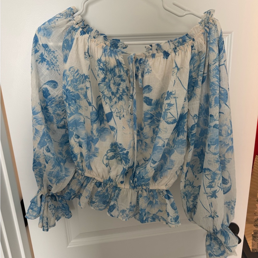 Cream Flutter Sleeve Blouse with Ruffled Tie Front